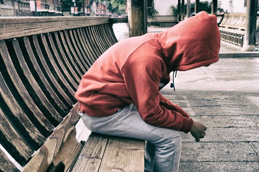 Person on park bench, can't see their face