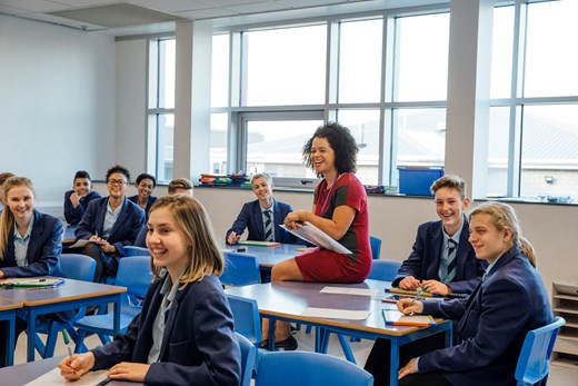 Teacher in classroom with students